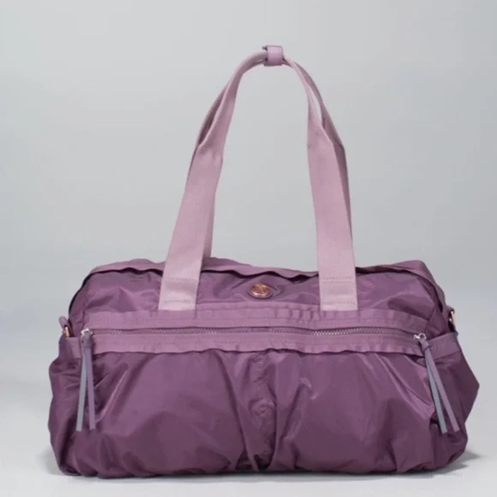 LULULEMON LILAC GYM TO WIN DUFFEL BAG IN GOOD USED CONDITION